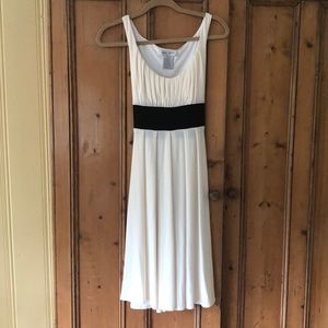 Flowing below the knee dress . Never wrinkles